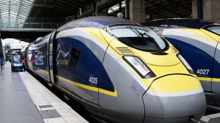 Two Eurostar trains pulled into a French rial station.